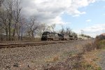 NS 7597 leads an intermodal train west through Cove PA